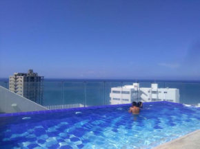 Гостиница Apartamento con salida al Mar  Санта Марта